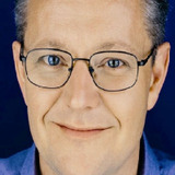 Jonathan Biggins — First Priest