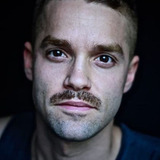 Max Befort — Man at Ticket Counter