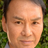 Harry Yi — Korean Poker Player (uncredited)