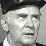 Ted Stanhope — Station Master (uncredited)