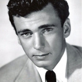 Richard Wyler — Party Guest (uncredited)