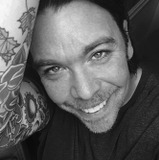 Kevin Munroe — Diner Patron (voice) (uncredited)