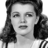 Claire James — Girl at Party (uncredited)