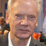 Andrzej Precigs — Building Engineer (uncredited)