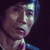 Biao Wang — Prisoner (uncredited)