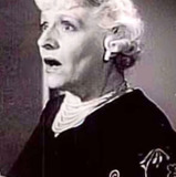 Loretta Russell — Racetrack Spectator (uncredited)