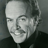 Michael C. Gwynne — Radio Announcer (voice)