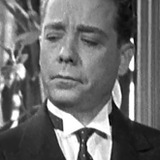 Fred Santley — Man in Lobby (uncredited)
