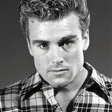 Ed Fury — Man with Tennis Racket at Accident Scene (uncredited)