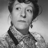 Rita Webb — Mrs Rusk (uncredited)