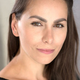 Andreea Helen David — Live Aid Volunteer (uncredited)