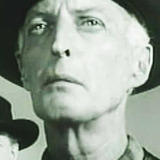 Bert Stevens — Police Detective (uncredited)