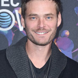 Christopher Backus — Travis