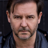 Craig Walker — CNN TV Crew Member (uncredited)