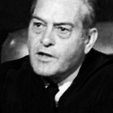 Chuck Hamilton — Police Desk Sergeant (uncredited)