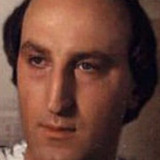 Marcello Bonini Olas — Teacher (uncredited)
