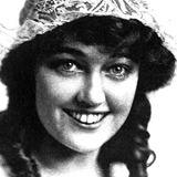 Betty Brown — Blonde Passenger (uncredited)