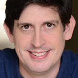 Michael Beardsley — Suspicious Video Store Patron (uncredited)