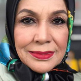 Ku Faridah — Malik's Mother