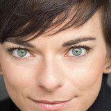 Andi Norris — Officer Garza