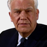 Harry Holcombe — Minister