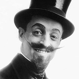 Leo White — Man in Phone Booth (uncredited)