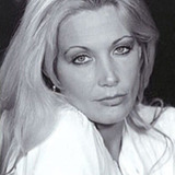 Loreta Tovar — Victim in Bed (uncredited)