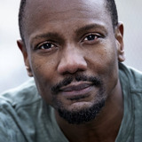 Dennis T. Carnegie — M.C. at Comedy Shock (as Dennis Pressey)