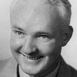 Frank McLure — Newsman (uncredited)