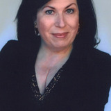 Winnie Holzman — Wiz-O-Mania Audience Member (uncredited)