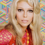 Nancy Sinatra — Self (archive footage)