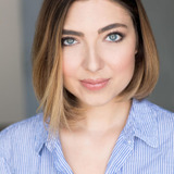 Shelby Young — Shiz Student (voice) (uncredited)