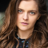 Olivia Jewson — Slug Club Party Member (uncredited)