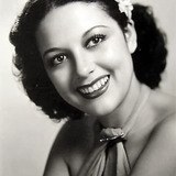 Movita — Singer (uncredited)