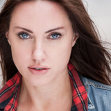 Stephanie Domini — Reporter (uncredited)