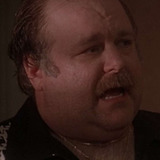 Eliott Keener — Sheriff McMillan