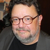 Roger L. Jackson โ โThe Voiceโ (voice)