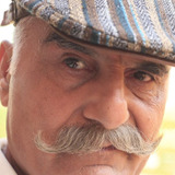 Kamal Chopra — Gurbaksh "Guruji" Singh