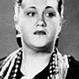 Audrey Betz — Courtroom Spectator (uncredited)