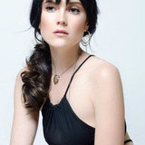 Natasha Esca — Female Hotel Staff