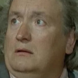 Giancarlo Badessi — Man with Moustache Promoting the Black Boxer (uncredited)