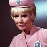 Maggie London — Hostess in Elevator (uncredited)