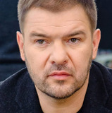 Tomasz Karolak — Melchior 'Mel'