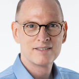 Interpol Officer at Briefing (uncredited)