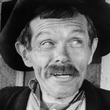 Walter Burke — Pater Backalis (Uncredited)