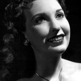 Джули Беннетт — Janet Lane (uncredited)