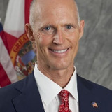 Rick Scott — Self (archive footage)