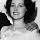 Dana Broccoli — Woman at St. Mark's Square (uncredited)