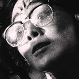 Nobu Kanaoka — Woman in Glasses