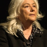 Enrica Antonioni — Boutique Manager (uncredited)